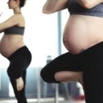 Pregnant woman strength training during pregnancy with prenatal personal training