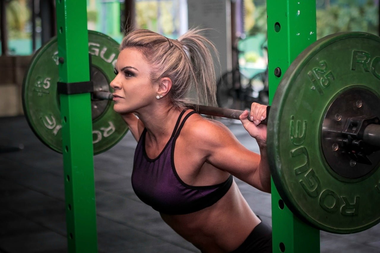 woman squatting while pregnant