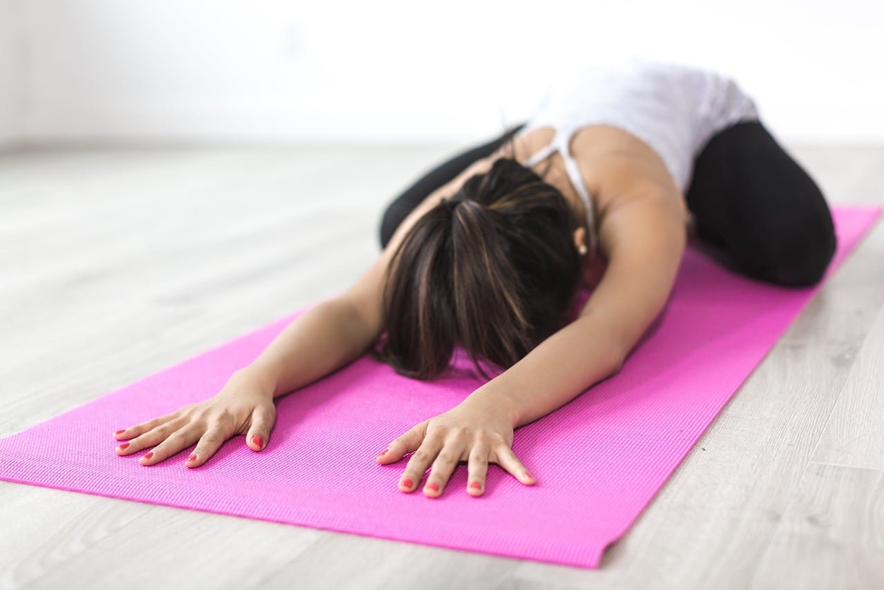 Woman performing Postpartum core exercises