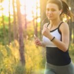 woman demonstrating exercises to avoid during pregnancy